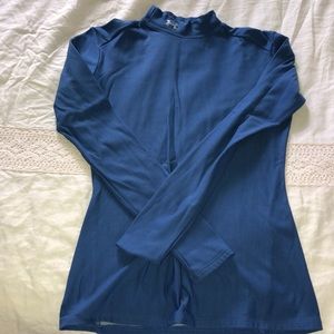 Blue Under Armour turtle neck.